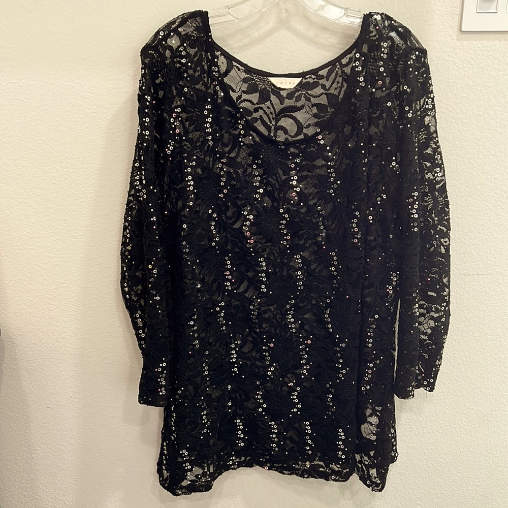Beautiful black tunic top with silver sequins